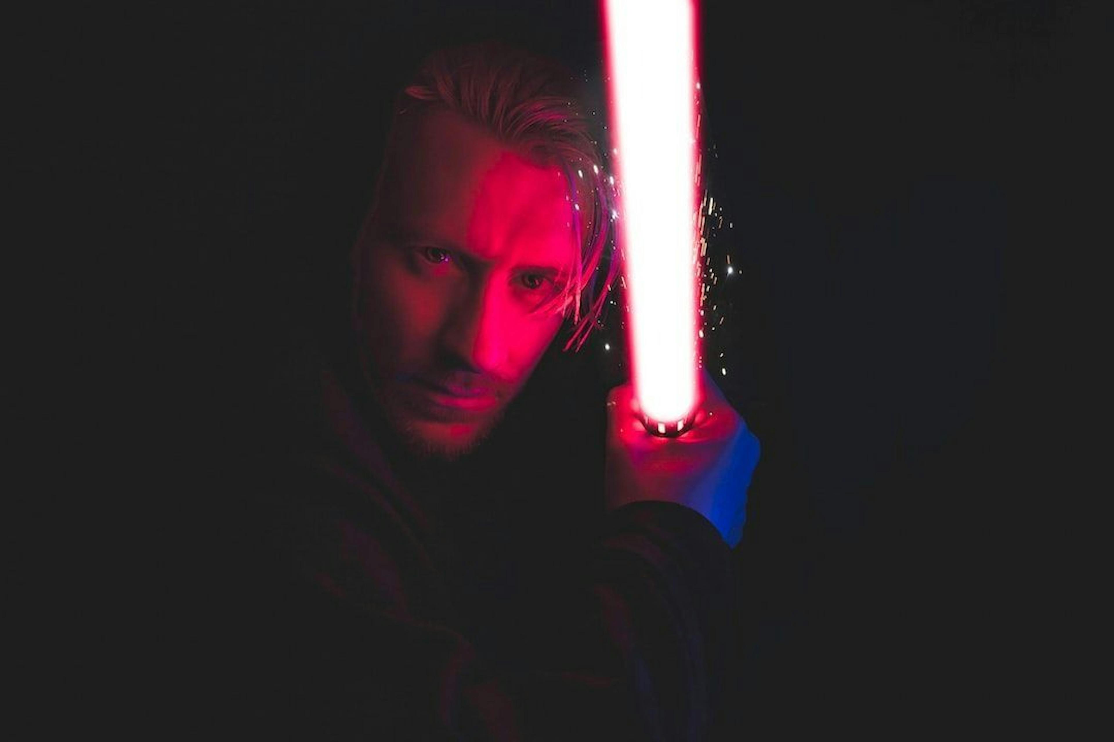 /the-cultural-impact-of-lightsabers-how-star-wars-changed-the-world-of-sci-fi-weapons feature image